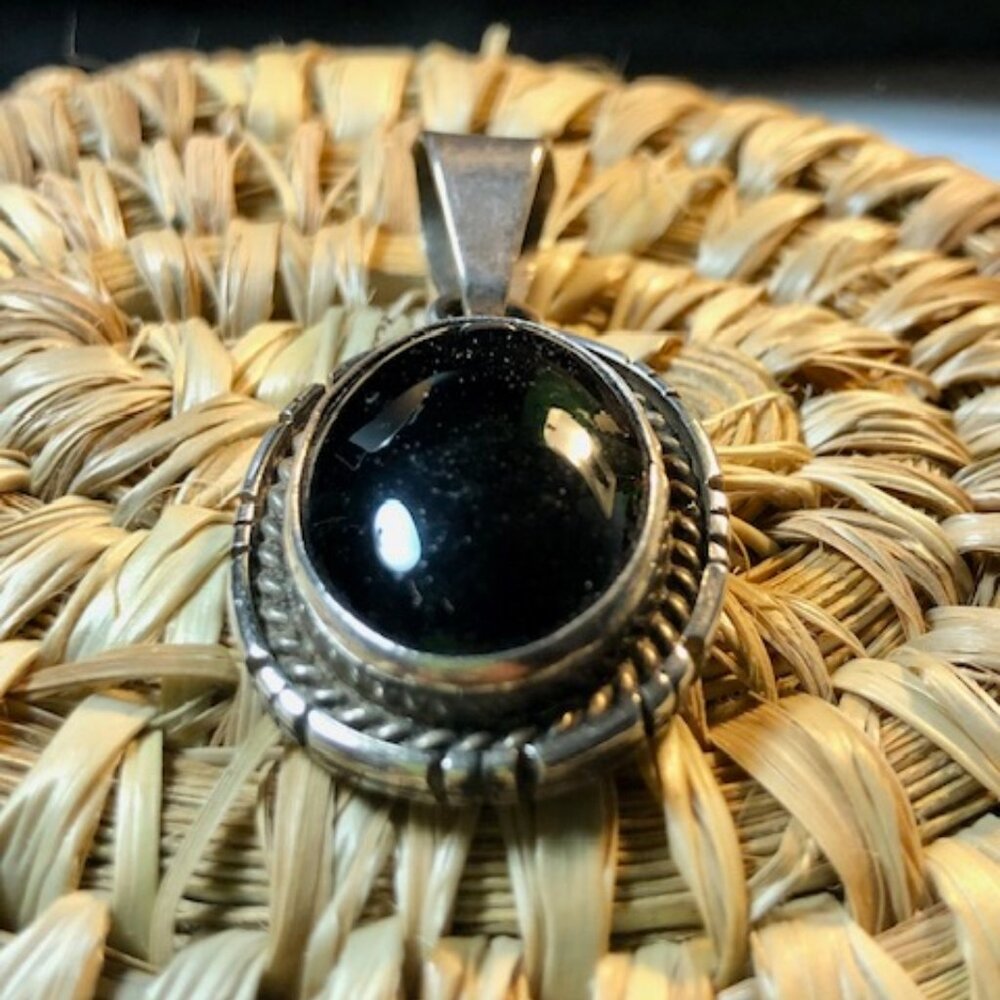 Vintage sterling silver black onyx oval cabochon pendant